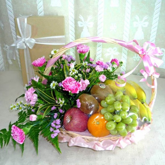 Pink Carnation And Fruits Basket Arrangement