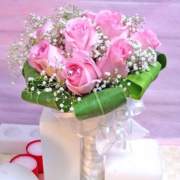 12 Pink roses wrapping with cordyline foliage